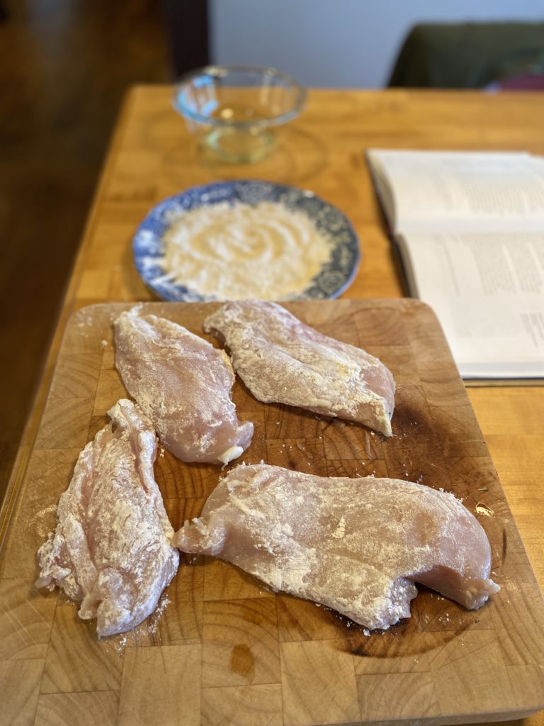 4 uncooked chicken breasts dredged in flour 
