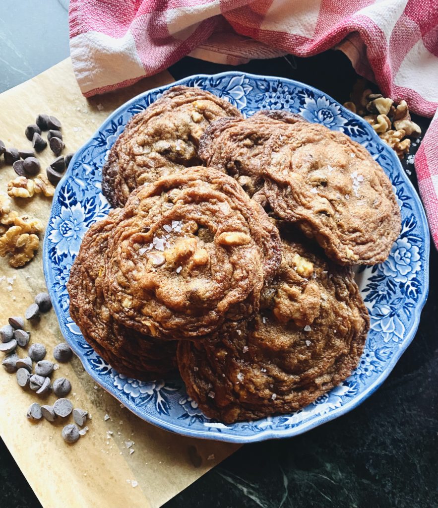 a blue plate filled with cookies