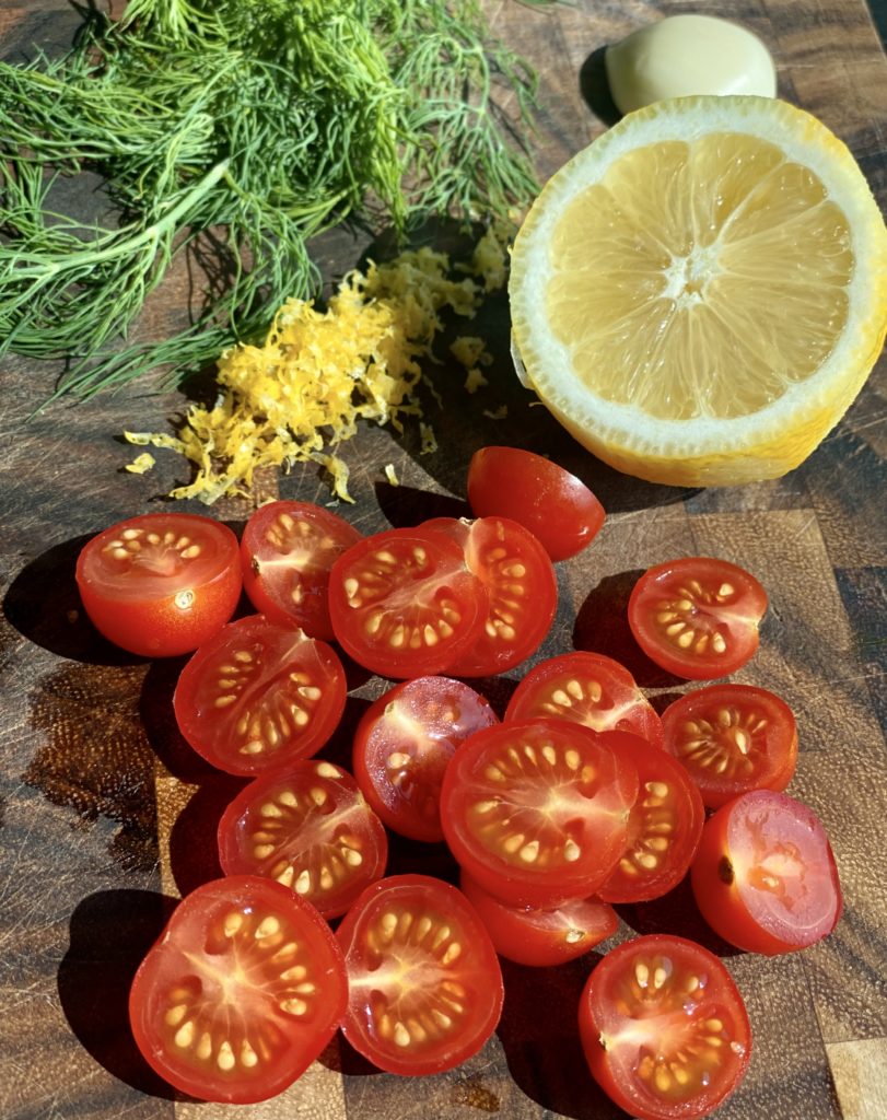 chopped tomatoes, dill and half a lemon 