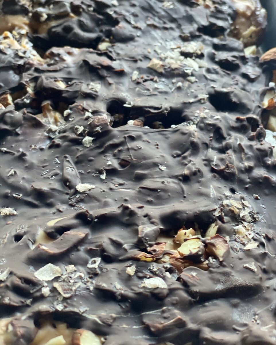 a pan of frozen dark chocolate and dates