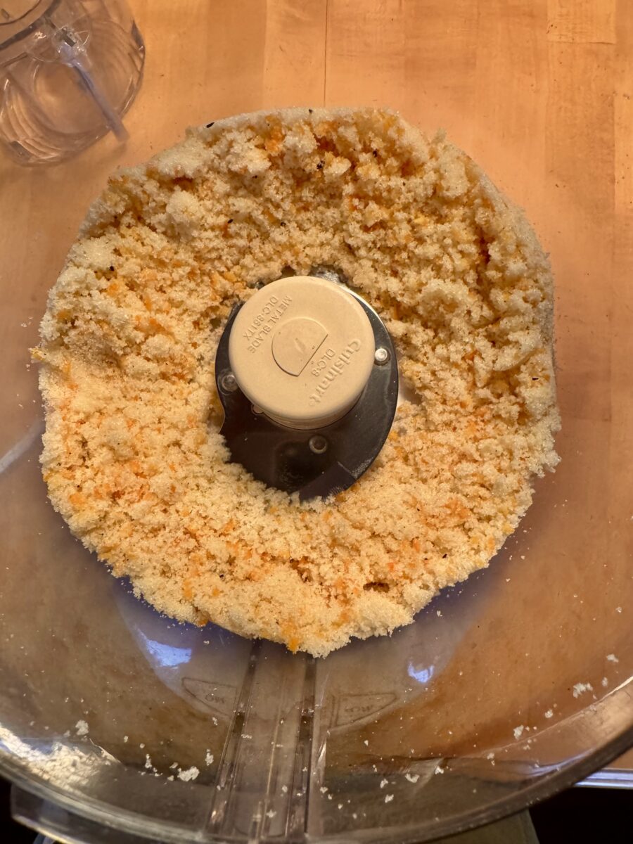 orange peel and sugar processed into a fine mixture in a food processor 